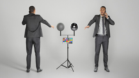 Young man in black suit talking on mobile phone 257