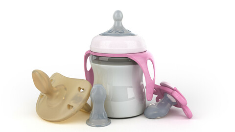 set of baby pacifiers with bottle