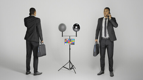 Young businessman with bag talking on mobile phone 283