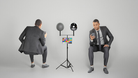 Sitting businessman with smartphone 290
