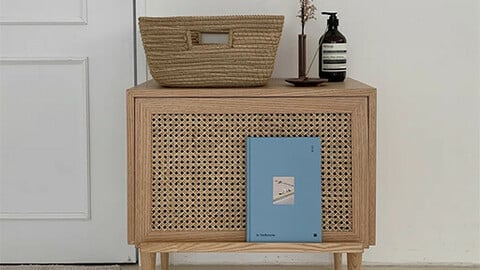 cane magazine rack side table